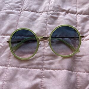 Green circle lense glasses